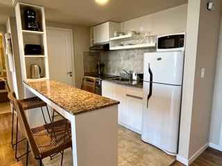 Alojamiento en el centro con vista parcial al lago y con cochera